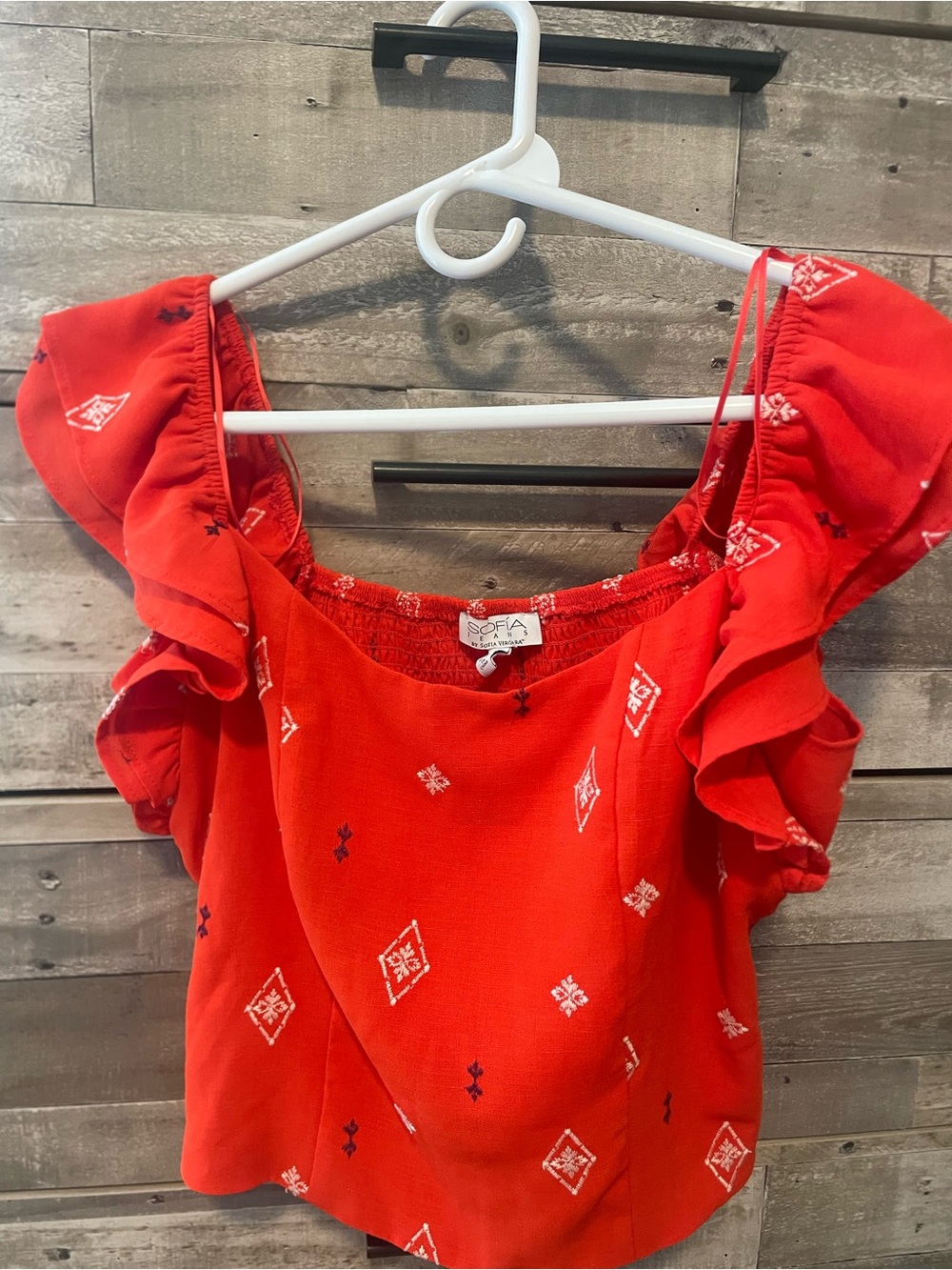 Sofia Vergara Orange Ruffle Sleeve Crop Top